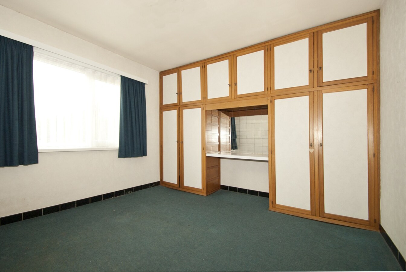 Gelijkvloers woning met tuin -  3 slpks 