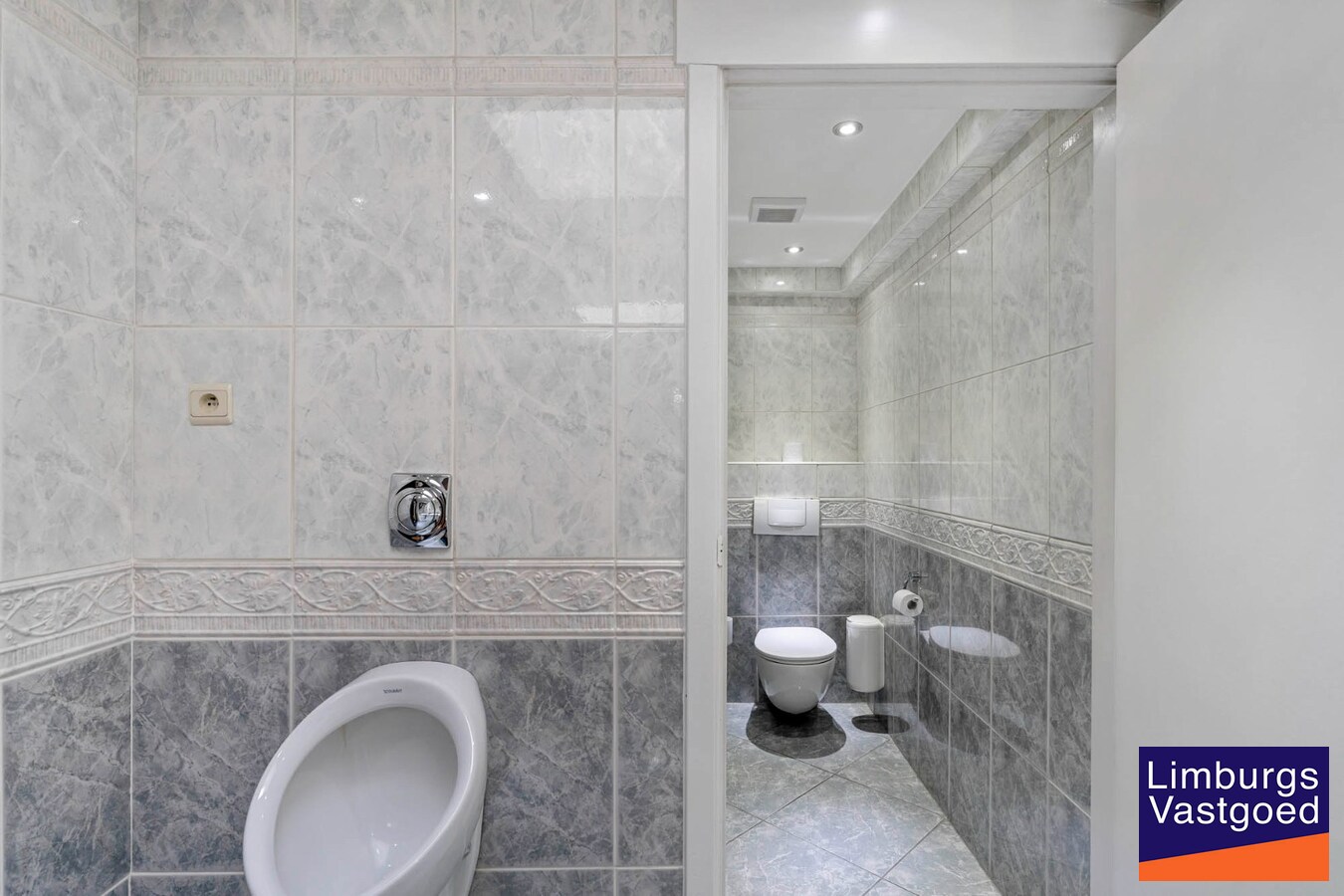 Bedrijfsgebouw met kantoren, magazijnen en woonst - groot 2580 m² 