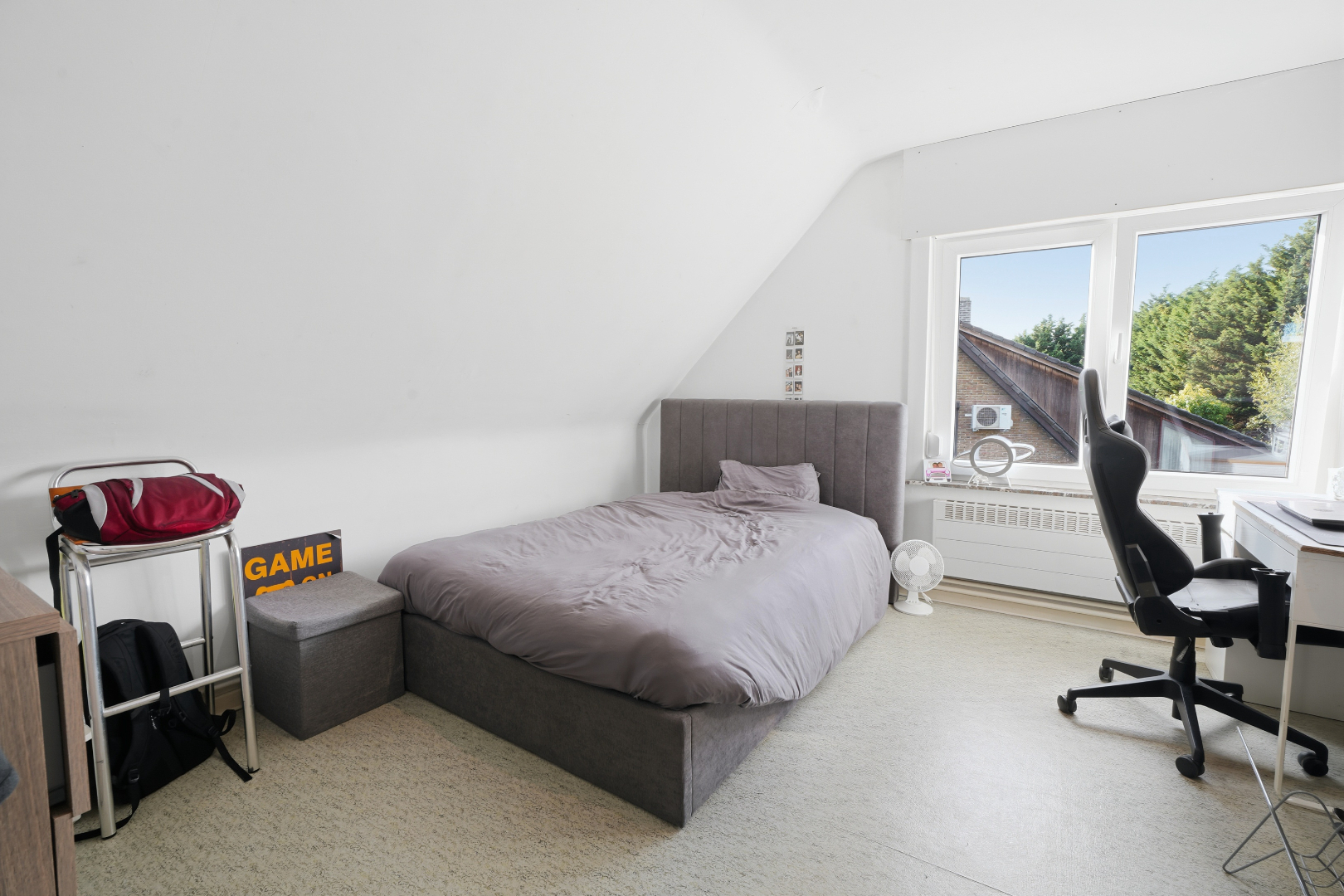 Halfopen woning met zongerichte tuin vlak bij het centrum van Veurne 