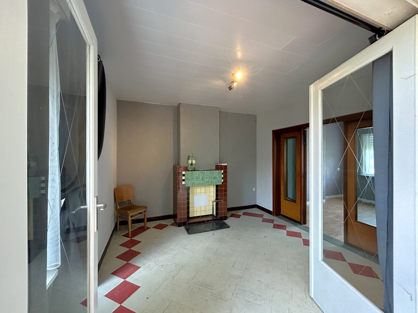 Te renoveren woning met loods/werkplaats in Geel 