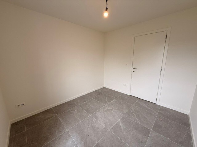 Halfopen nieuwbouwwoning met 4 slaapkamers gelegen te Opitter. 
