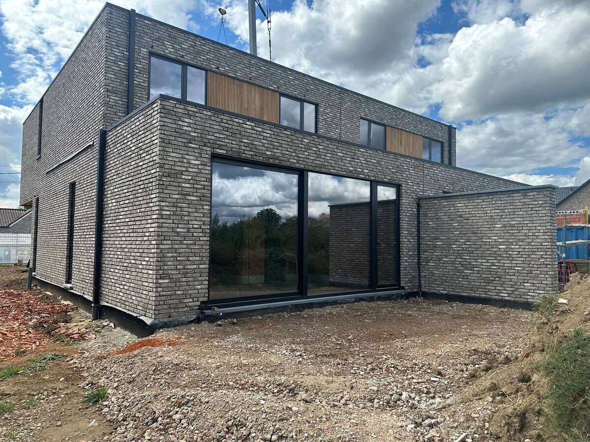 Mijmeren over de velden - in een luxueuze half open nieuwbouwwoning in Rotem 