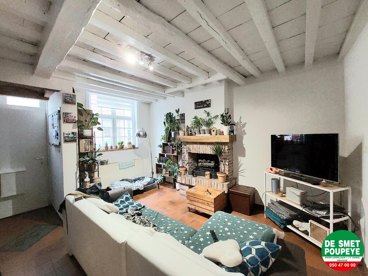 Rijwoning met gemeenschappelijk terras 