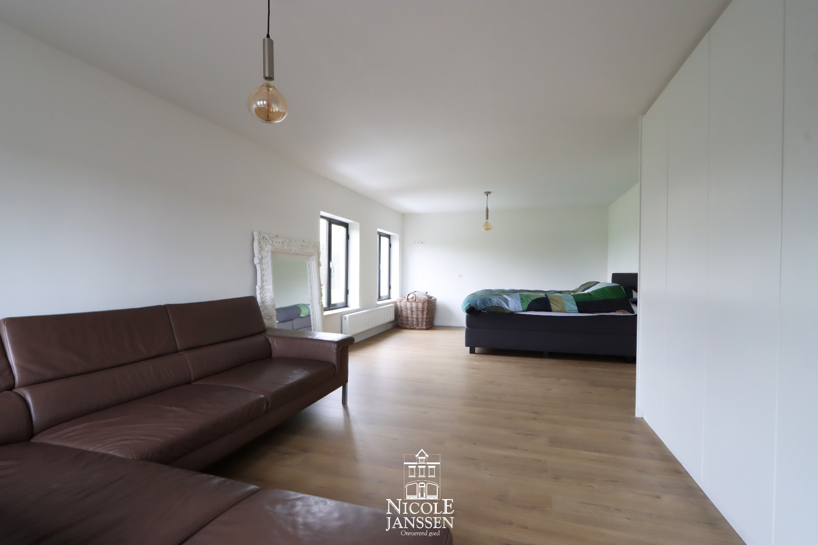 Ouderlijke slaapkamer met zithoek 