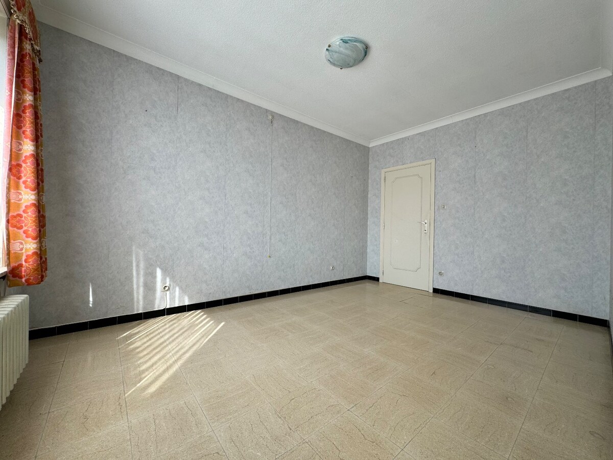 Alleenstaande woning met 4 slaapkamers en garage te Westende 