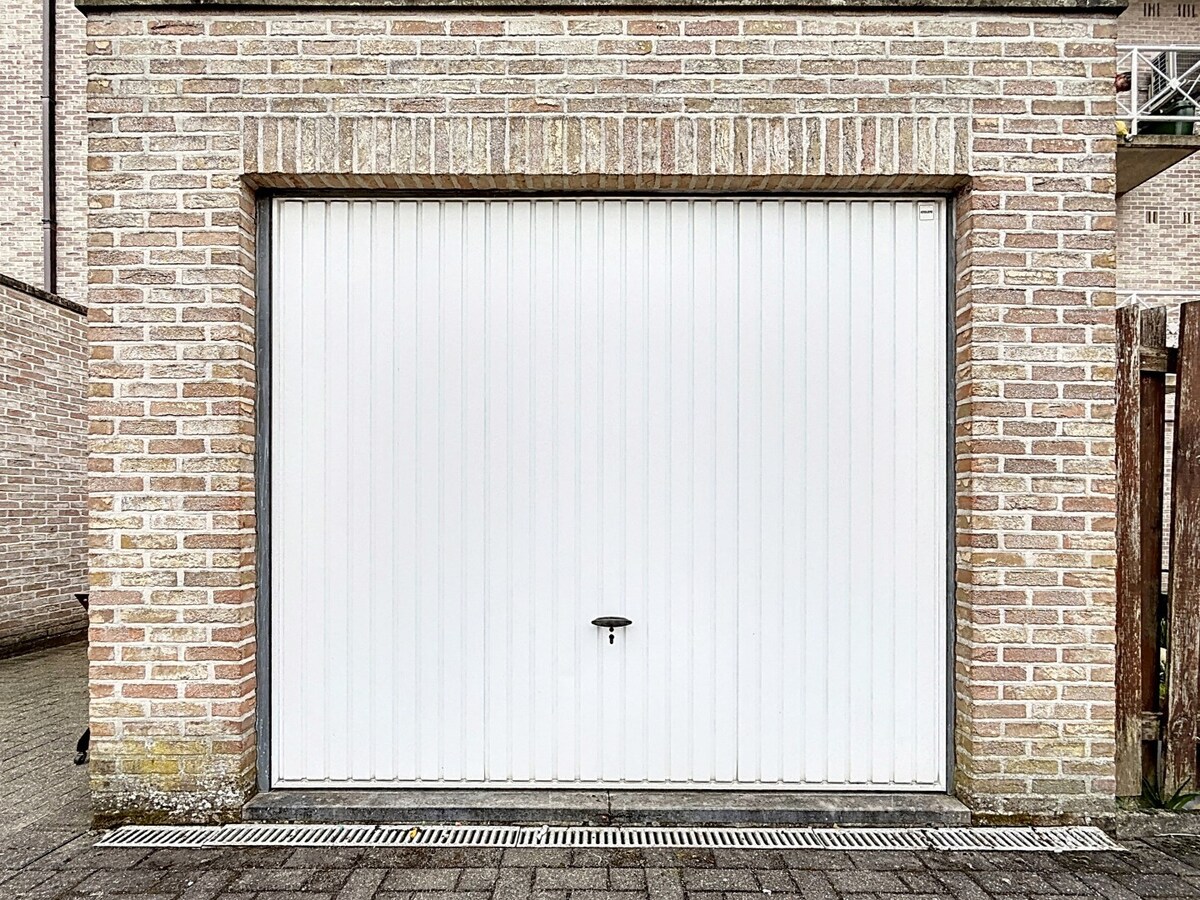 Energiezuinig gelijkvloersapp. met tuintje en garage te centrum Wetteren 