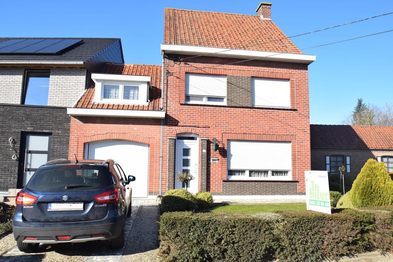 Ruime halfopen 3-slaapkamer-woning met garage en tuin 