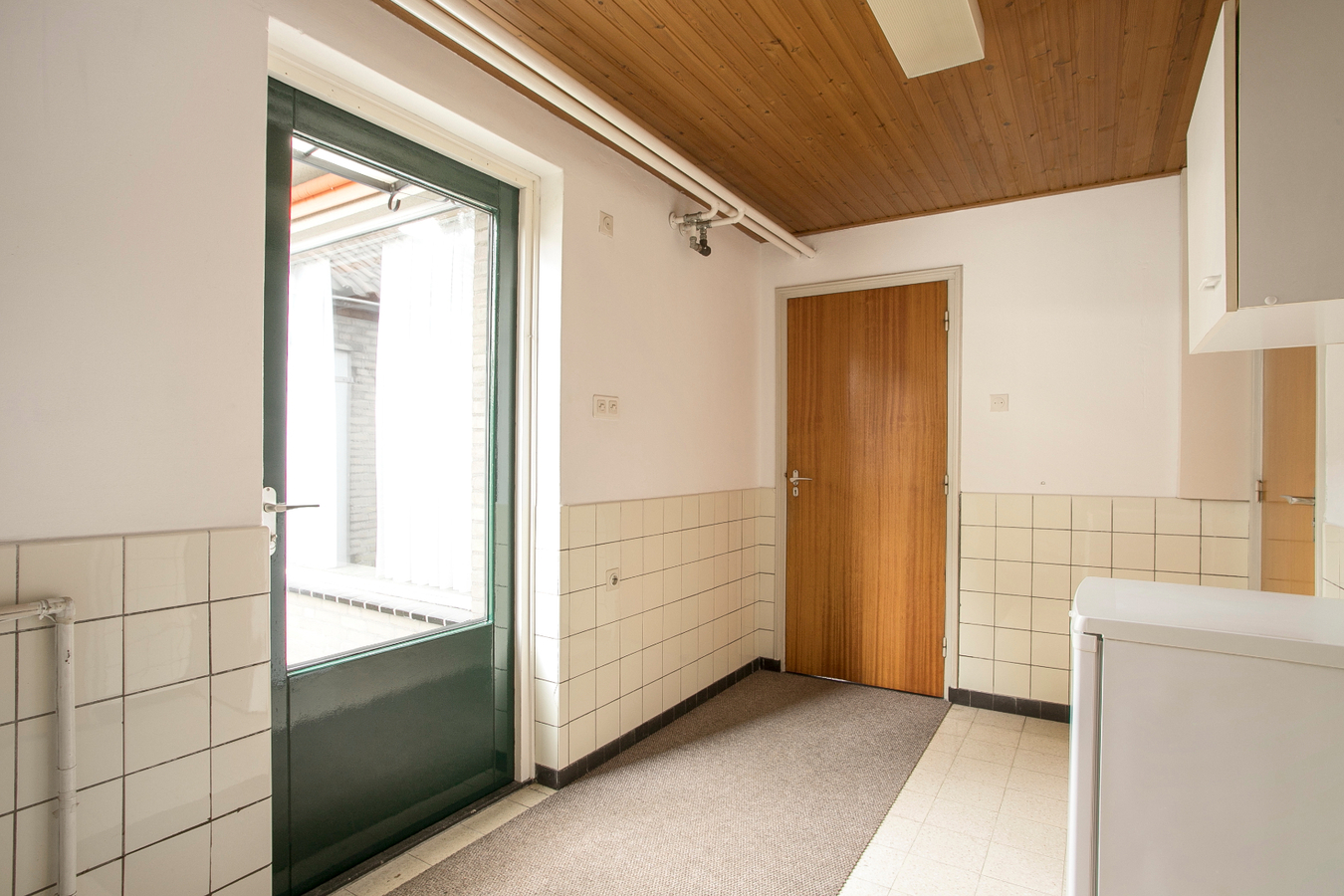 Vrijstaande eengezinswoning met garage en carport. 