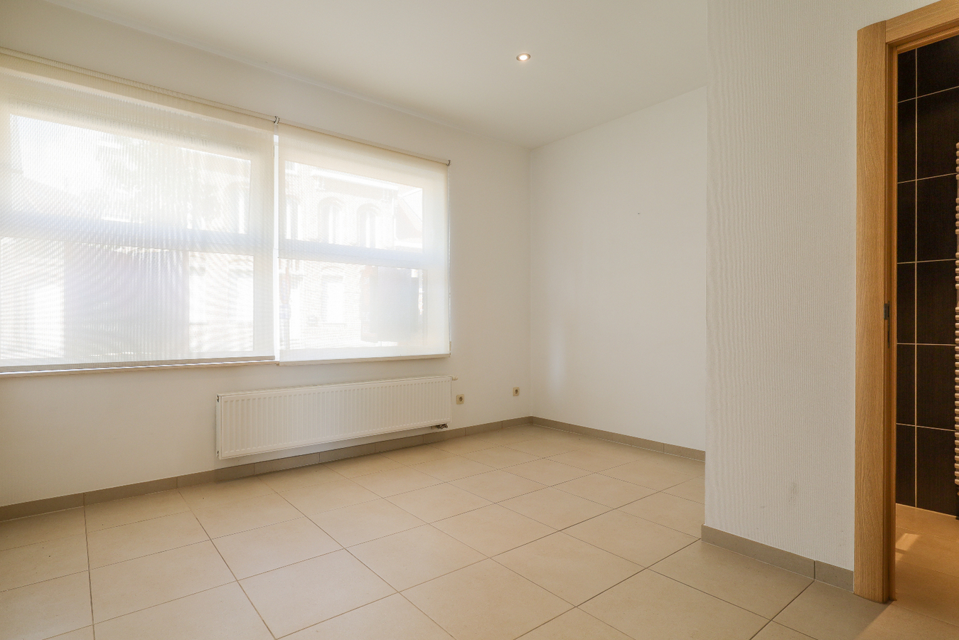 Gelijkvloers appartement met garagebox op uitstekende ligging 