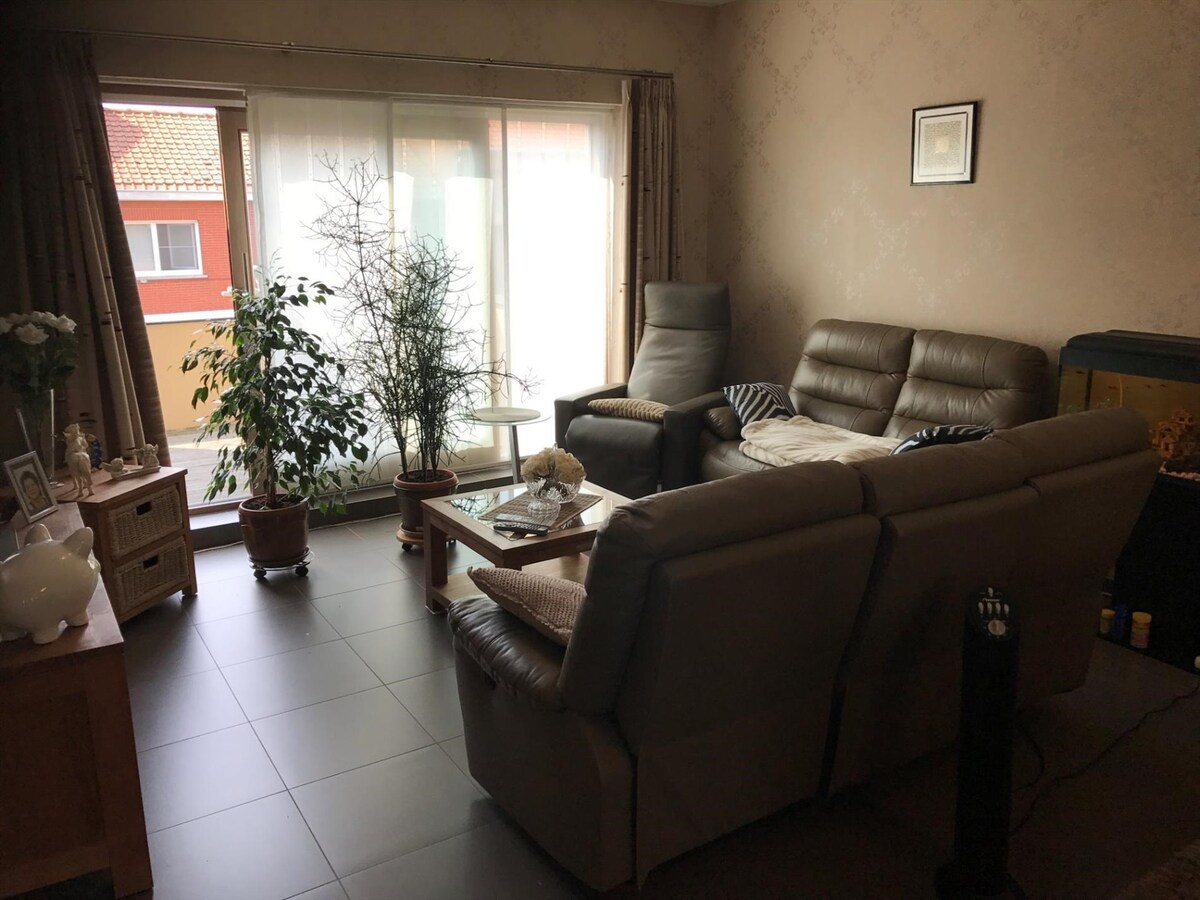 Ruim appartement met 2 terrassen, carport, tuinhuis en gemeenschappelijke tuin 