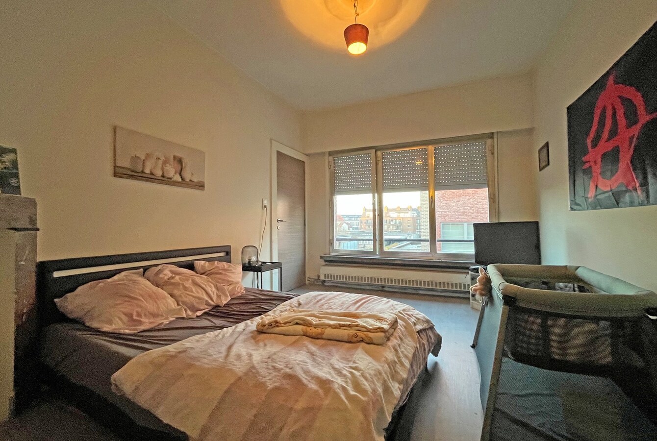 2 appartementen met gelijkvloers  magazijn 