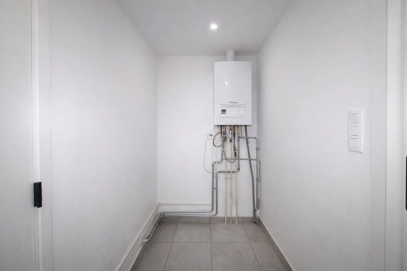 Te koop: Centraal gelegen woning met twee slaapkamers, zolderverdieping, EPC label C én tuin in Sint-Niklaas! 