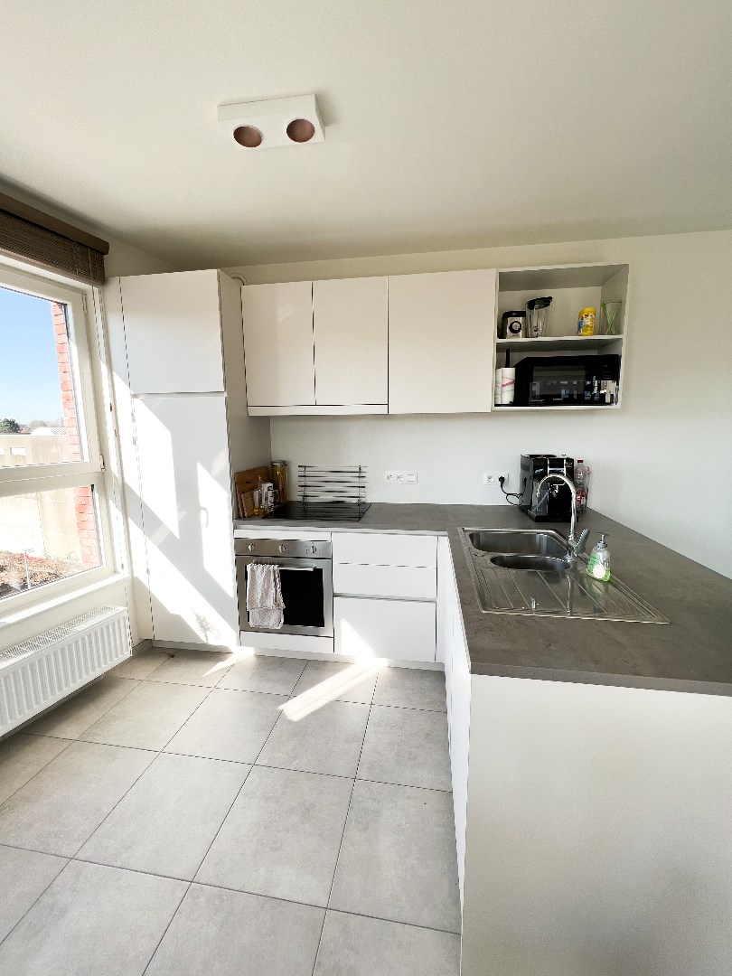 Harelbeke, klassevol 2 slaapkamer appartement met garage 275.000 euro 