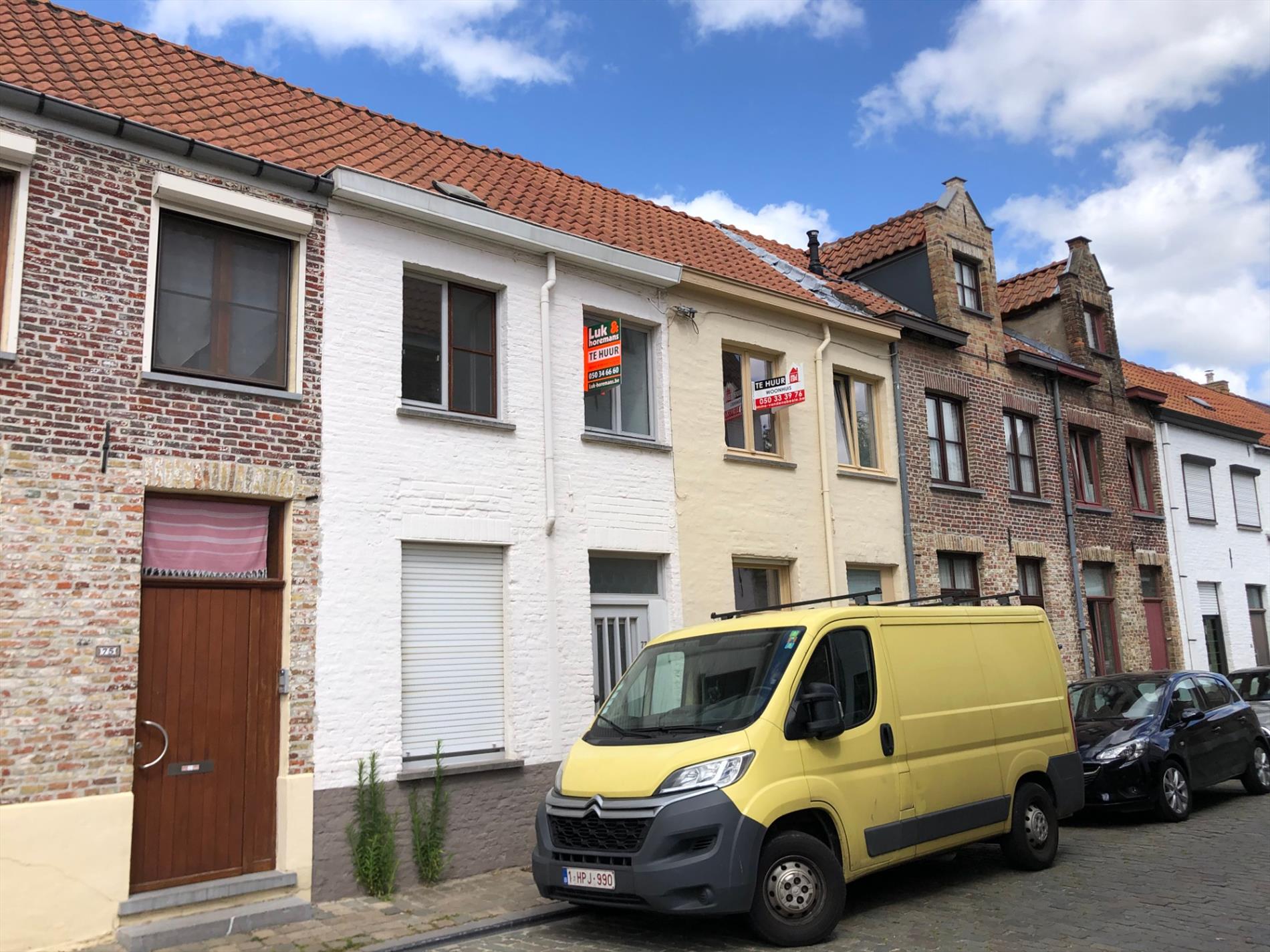 Opgefriste rijwoning met stadskoertje 