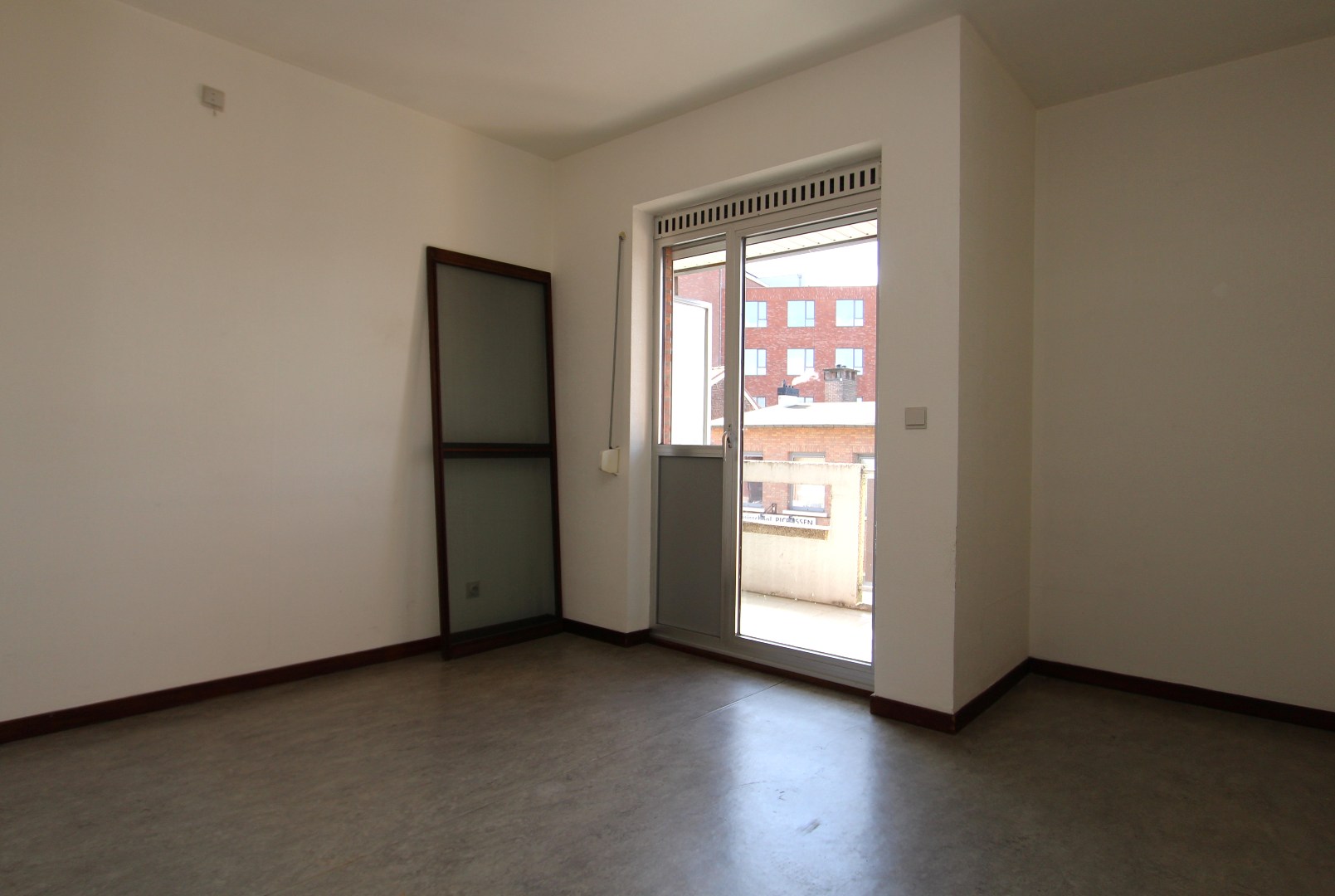 slaapkamer met doorgang balkonterras