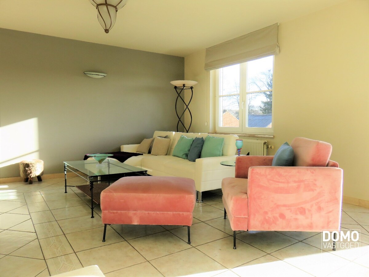 GUNSTIG GELEGEN OPBRENGSTEIGENDOM TE HASSELT 