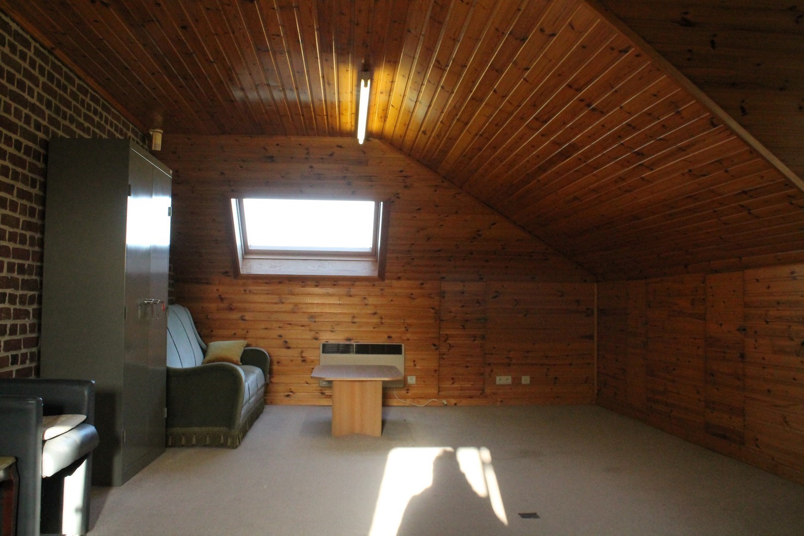 Commerciële ruimte van 134 m² met bijhorende parkingplaatsen 