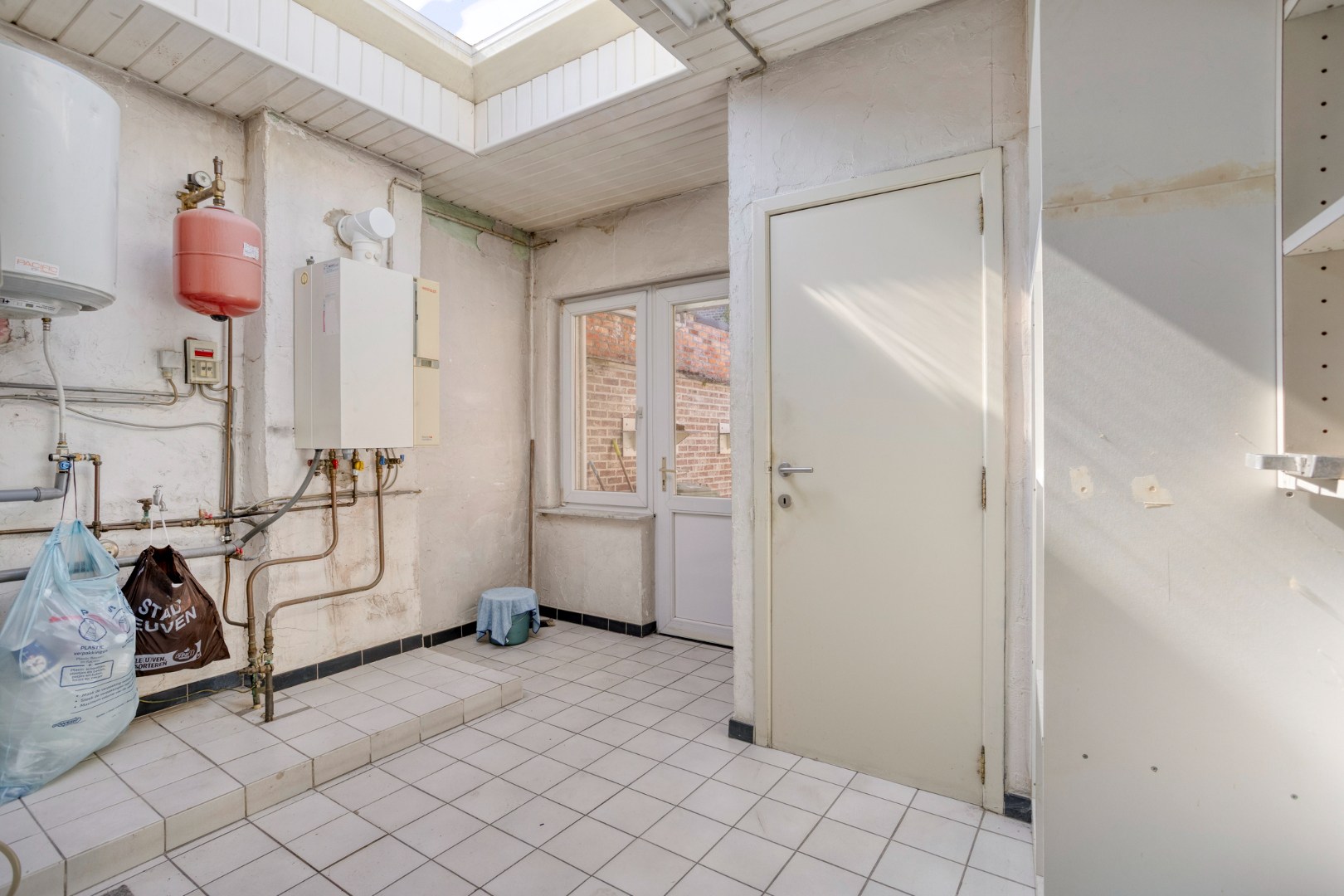 Centraal gelegen rijwoning in Kessel-Lo met parking - EPC 246 kwh/m² 