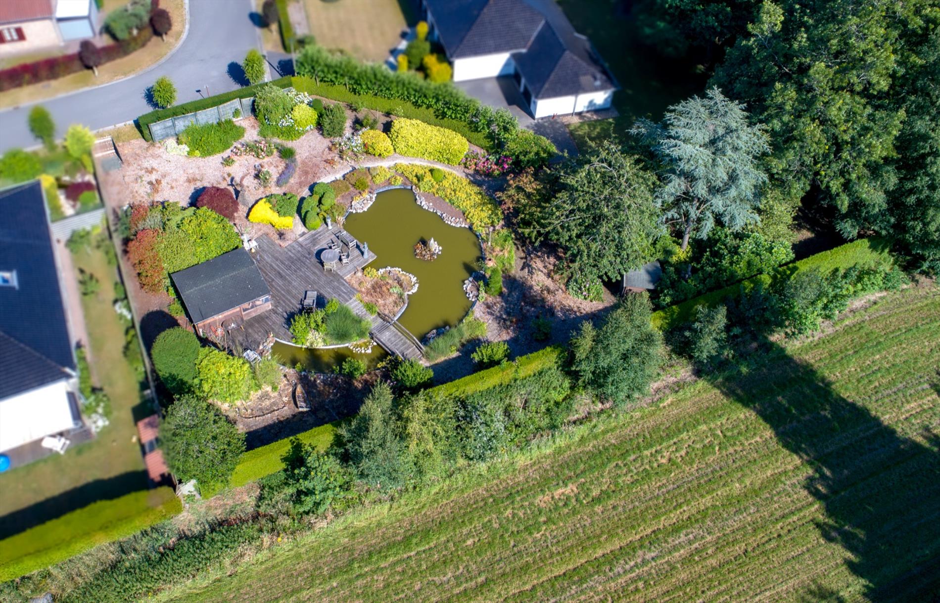 Westelijk georiënteerd lot bouwgrond 1.223m² in residentiële "bloemenwijk" te Maldegem 