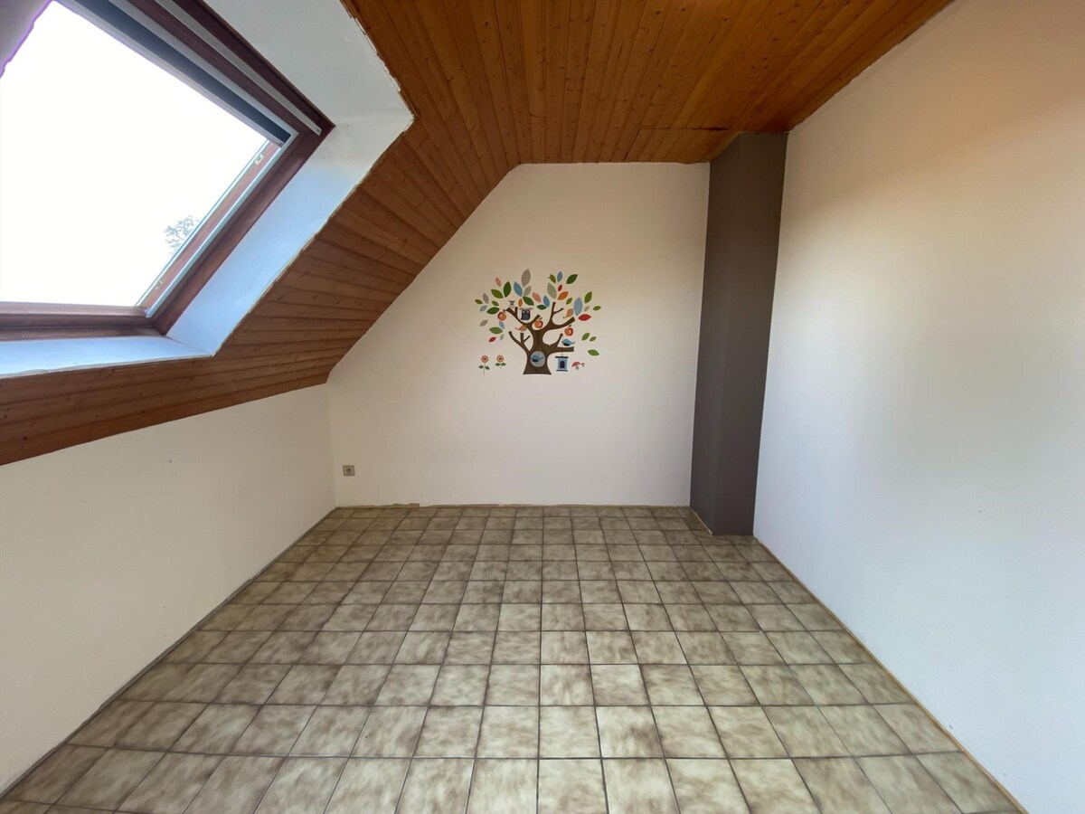 Rustig gelegen woning met garage en zonnige tuin te Poperinge 