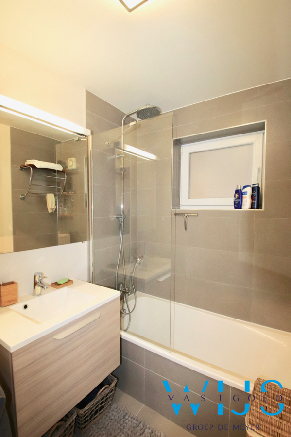 Gelijkvloers appartement met zonnige tuin &amp; dubbele garage te Sint-Laureins ! 