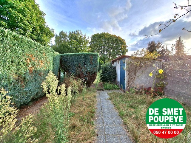 Ruime rijwoning met garage en tuin 