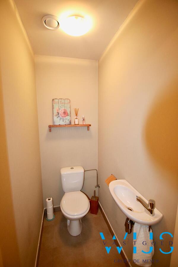 Charmant instapklaar tweeslaapkamer appartement in centrum Ertvelde! 