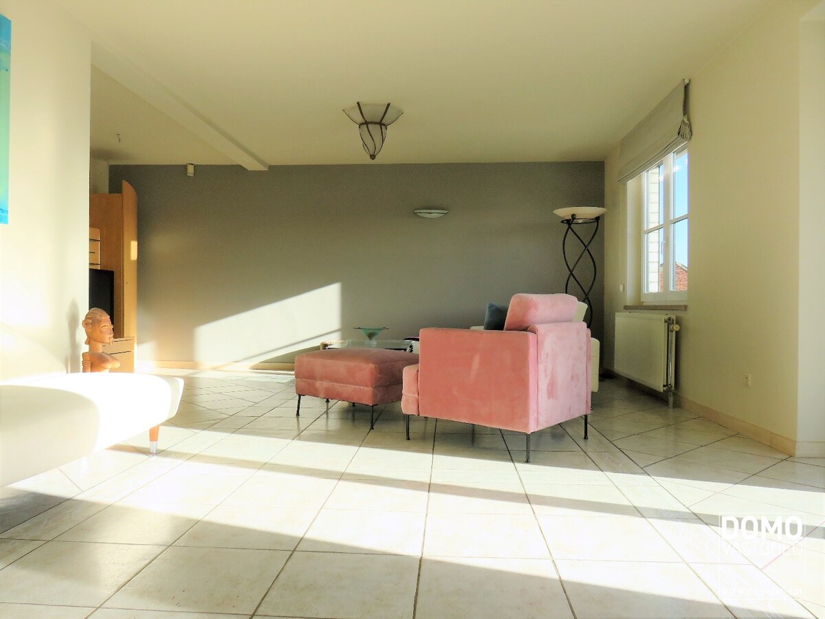 GUNSTIG GELEGEN OPBRENGSTEIGENDOM TE HASSELT 