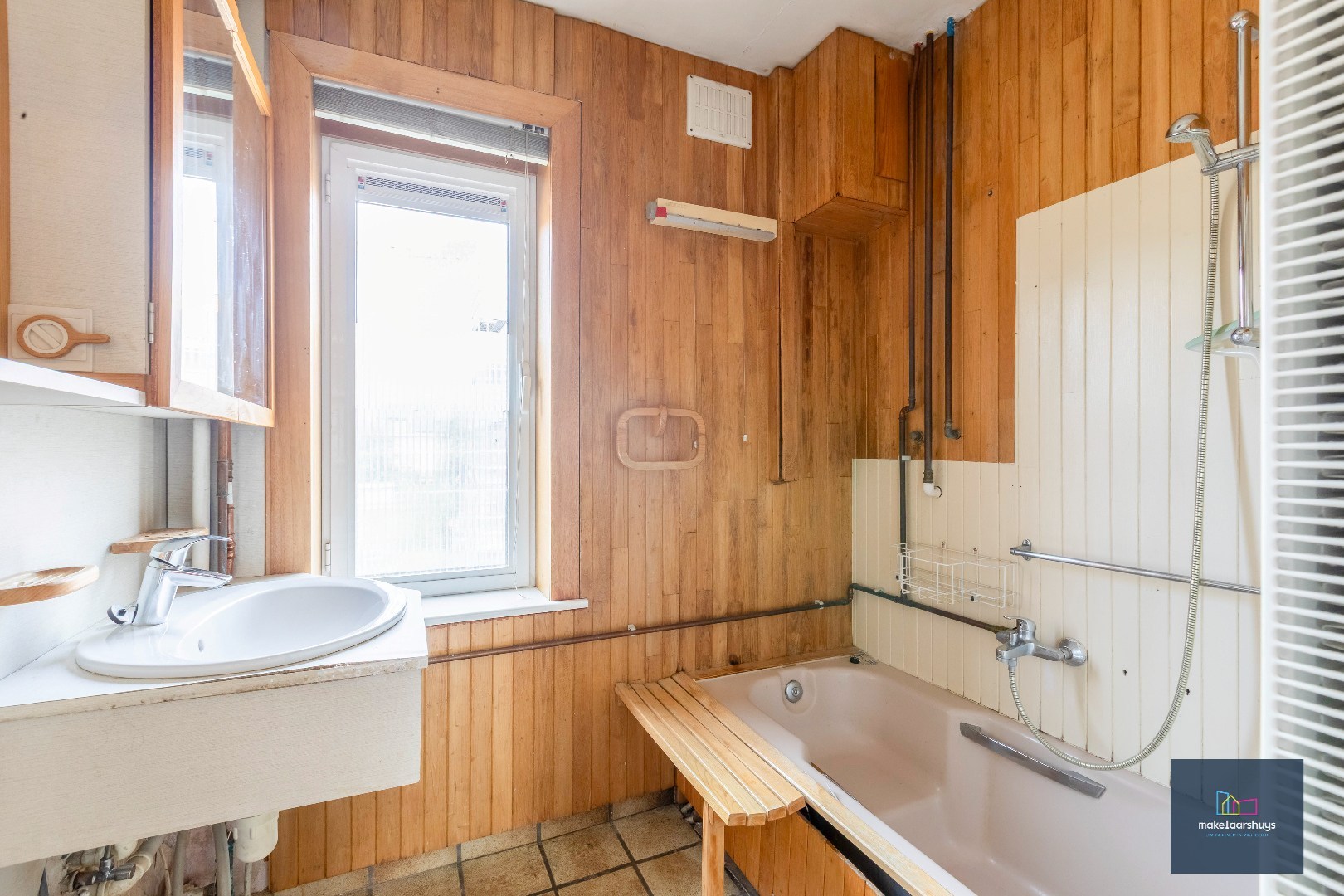 Gunstig gelegen woning met tuin en garage 