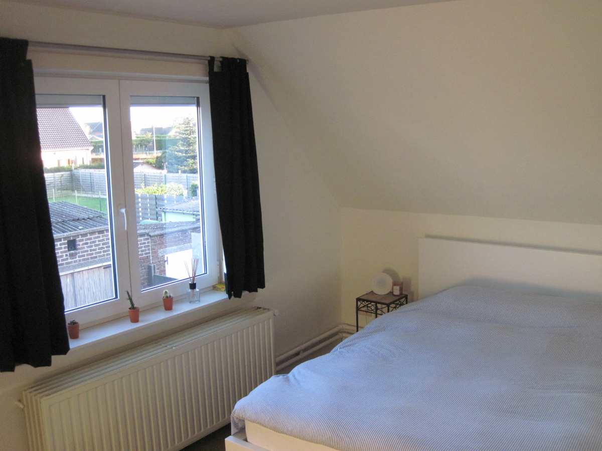 Degelijke én gezellige woning. Met tuin en met garage. 