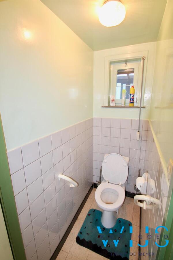 Zeer degelijk woonhuis op een ruim rustig perceel te Bassevelde ! 