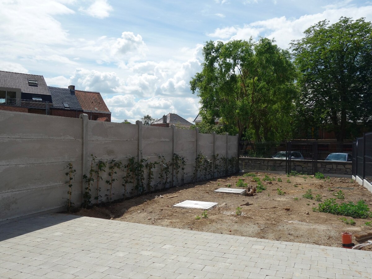 Construction moderne en plein coeur du village de Pecq ! 