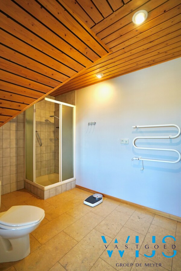 Fantastische open bebouwing met dubbele garage in gegeerde woonwijk te Evergem 