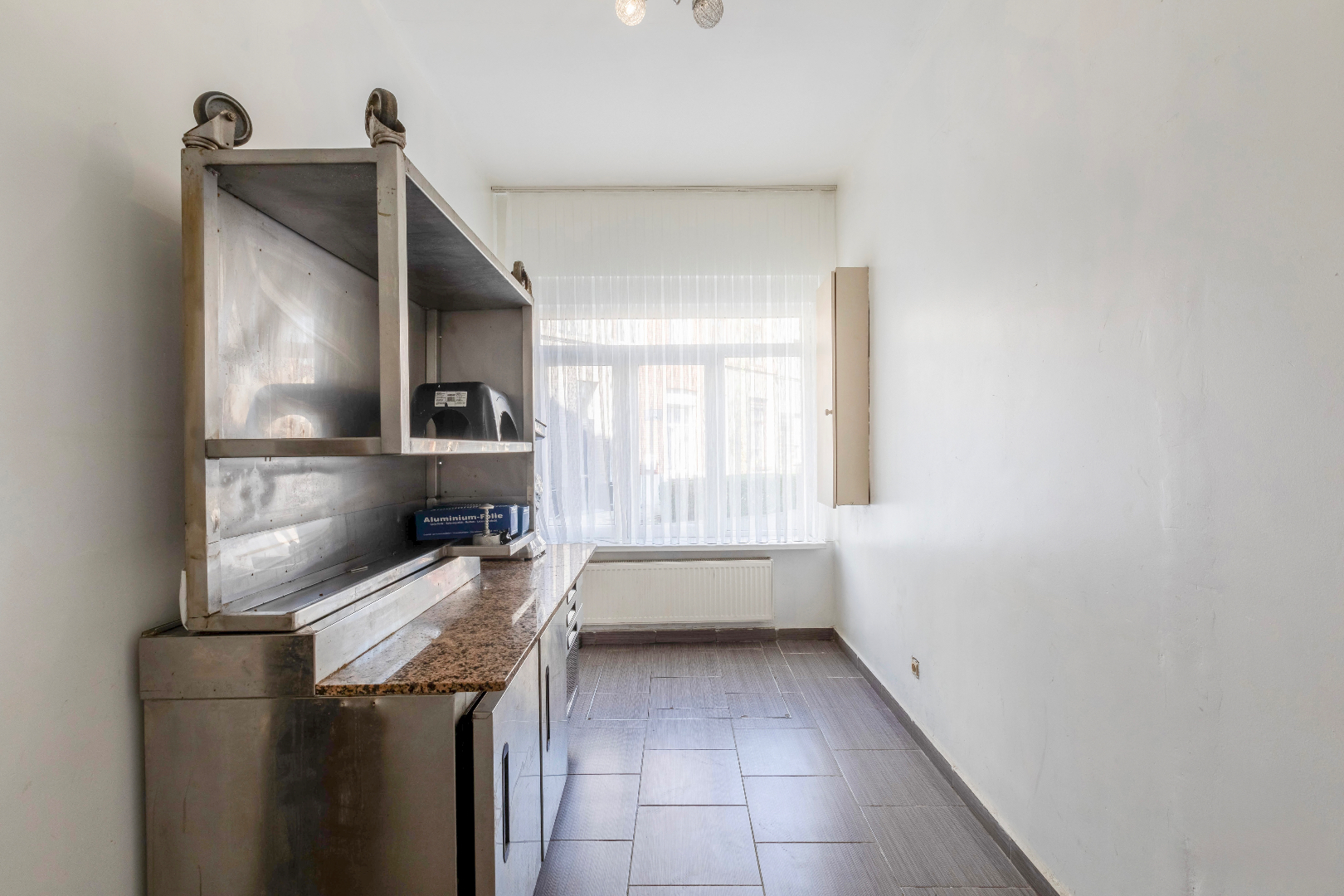 Ruime stadswoning met 5 slaapkamers en handelsruimte 