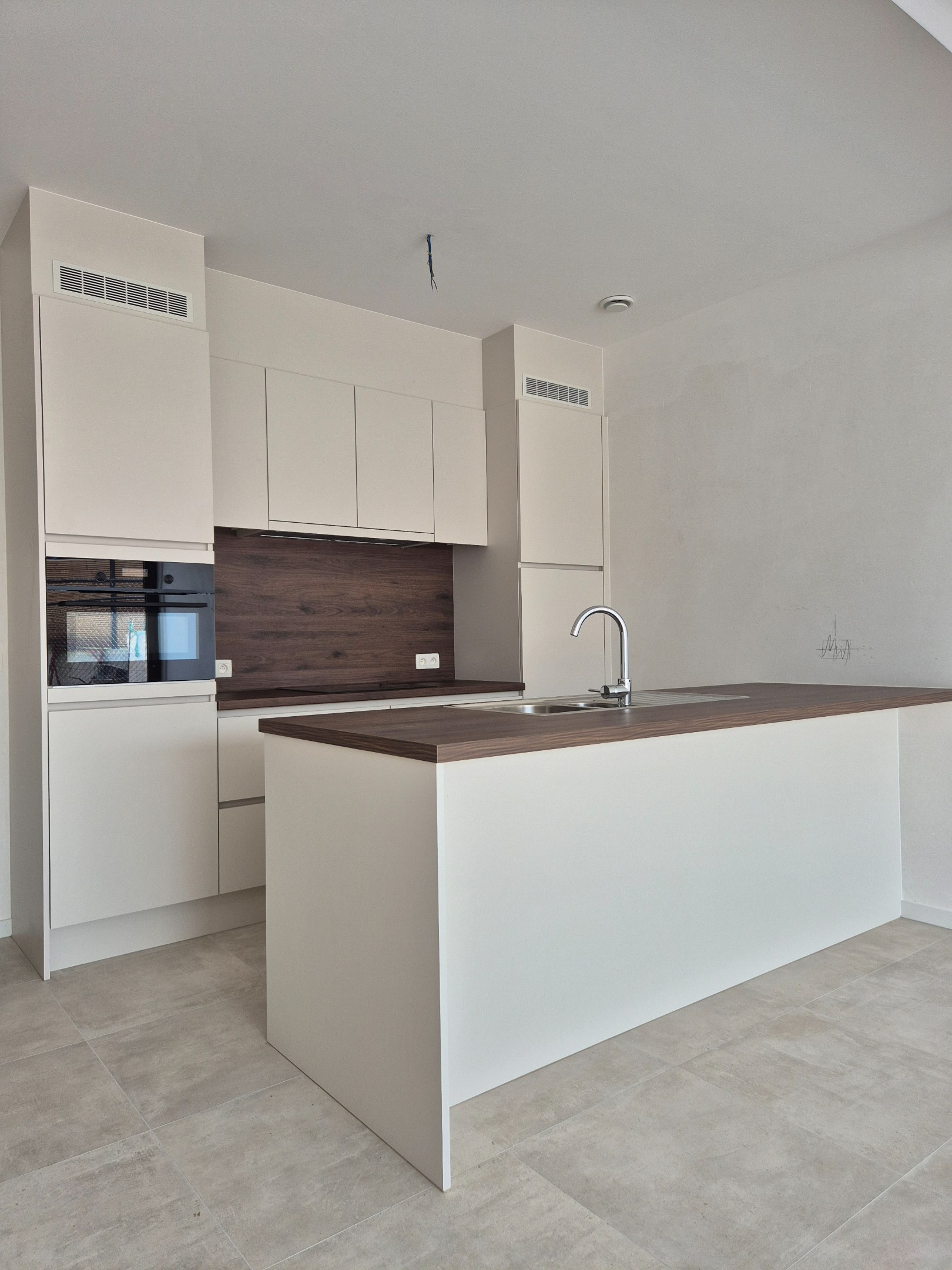 Gelijkvloers appartement met 2 slaapkamers, tuin en terras 
