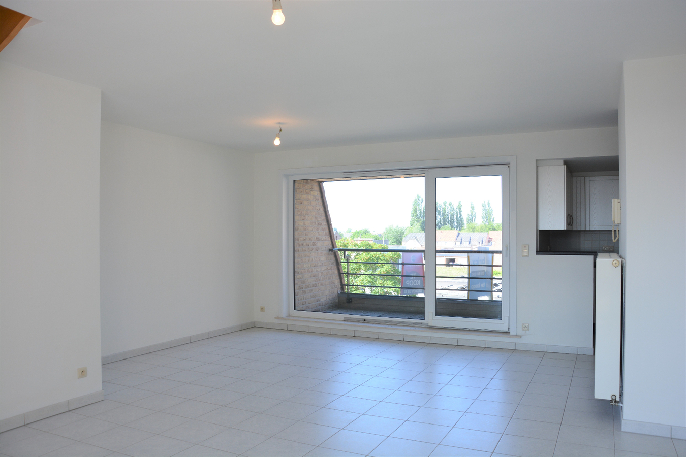 Lichtrijk duplex-appartement met 2 terrassen in het centrum 