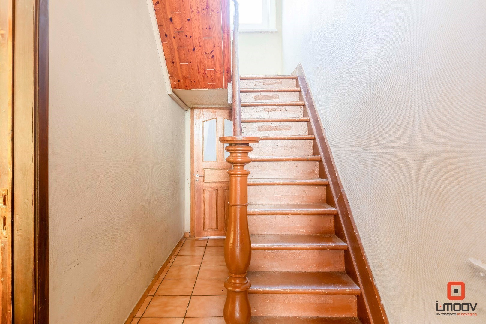 Rijwoning met 4 slaapkamers en koer vlakbij het centrum van Sint-Amandsberg 