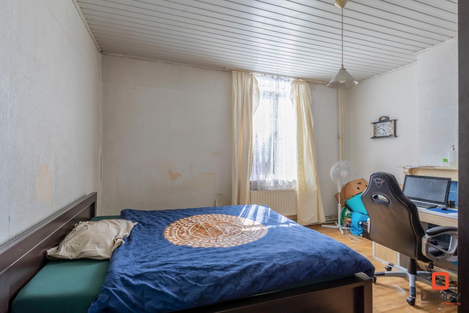 Rijwoning met 4 slaapkamers en koer vlakbij het centrum van Sint-Amandsberg 