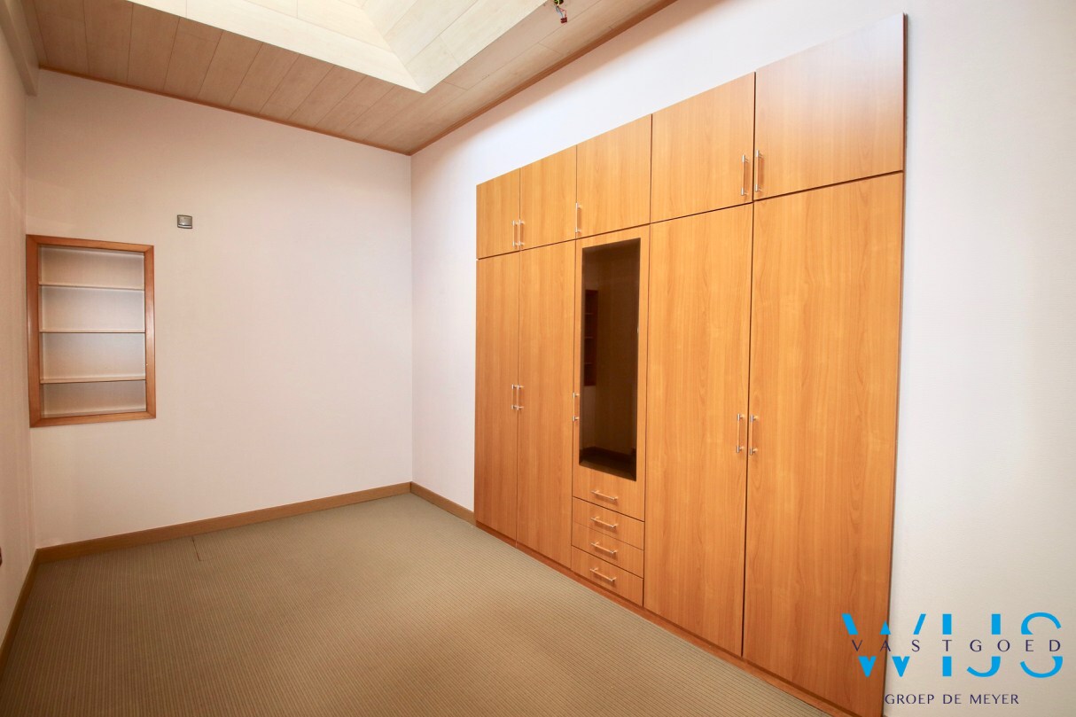 Ruim 2 slaapkamerappartement met zonneterras &amp; garage in hartje ERTVELDE! 