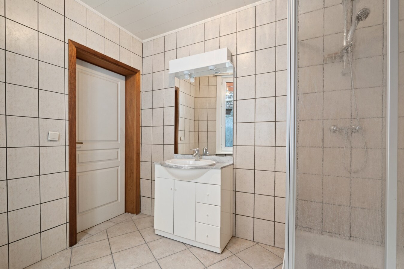 Handelswoning in centrum Zomergem! 