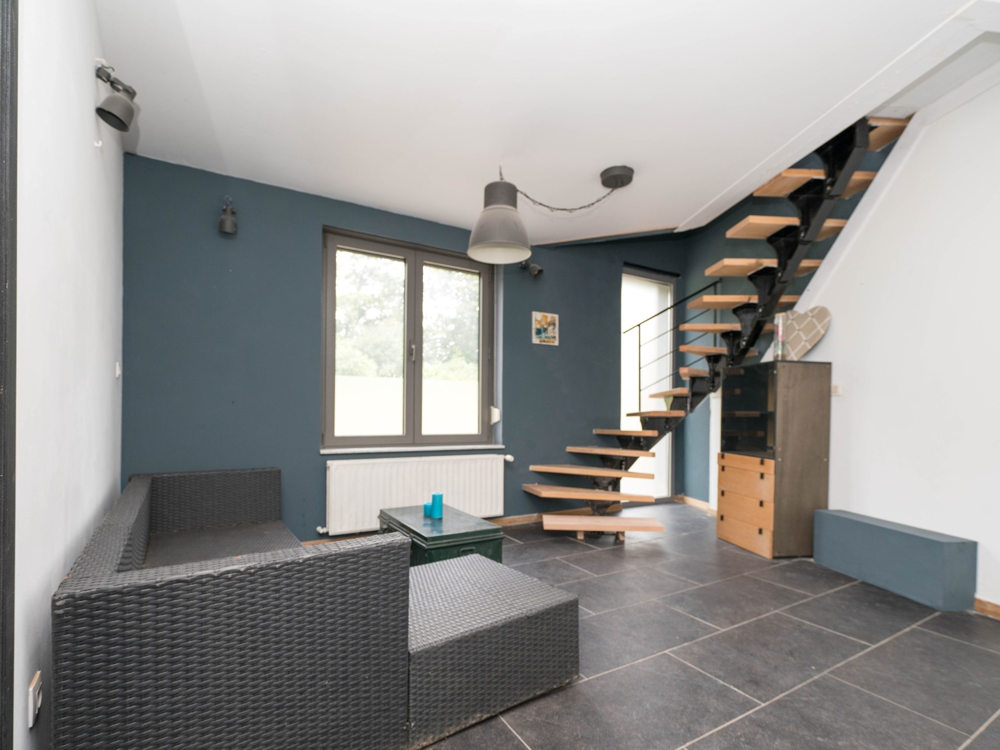 Gerenoveerde woning met 4 kamers, garage en stadstuintje 