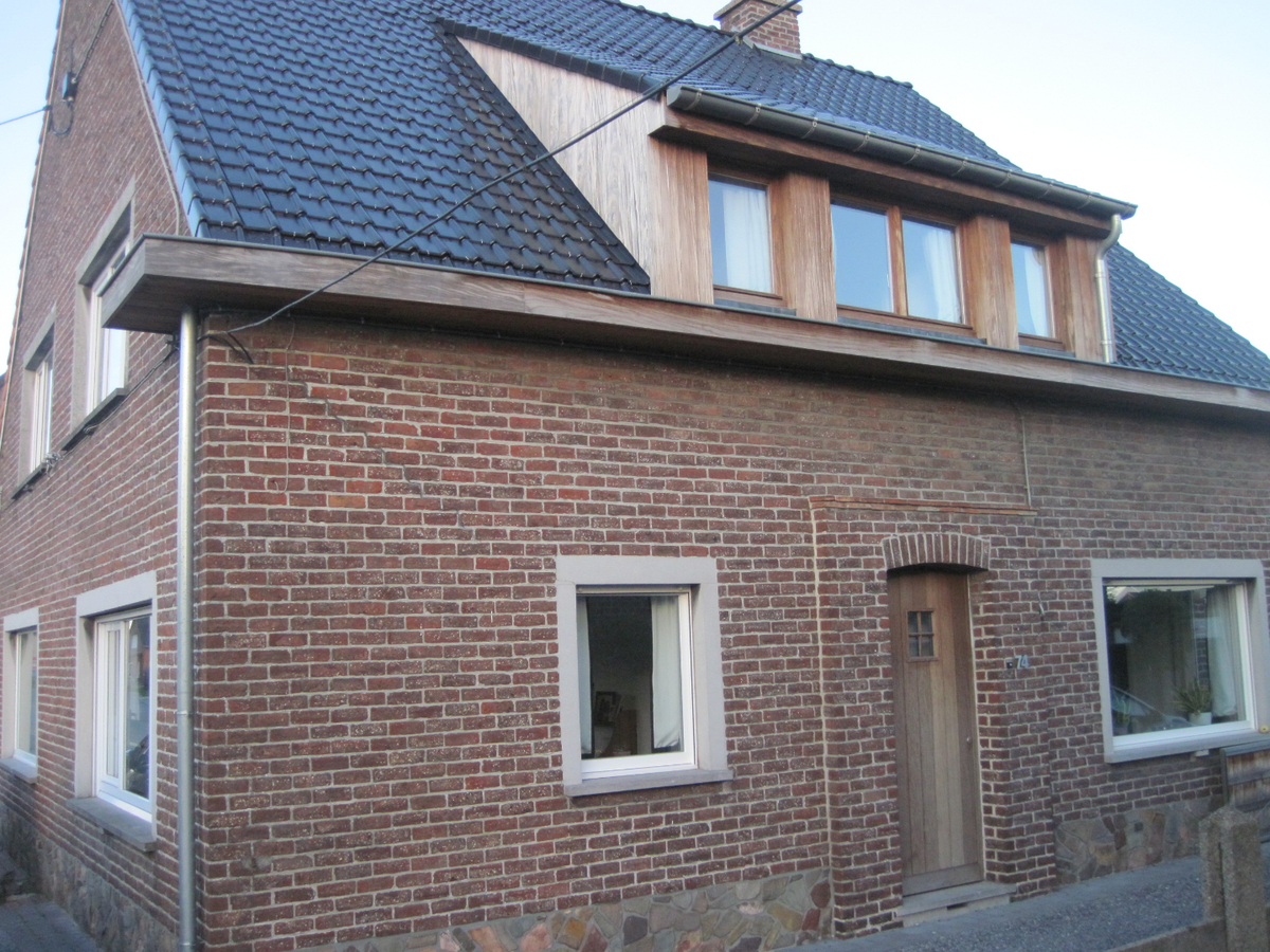 Degelijke én gezellige woning. Met tuin en met garage. 