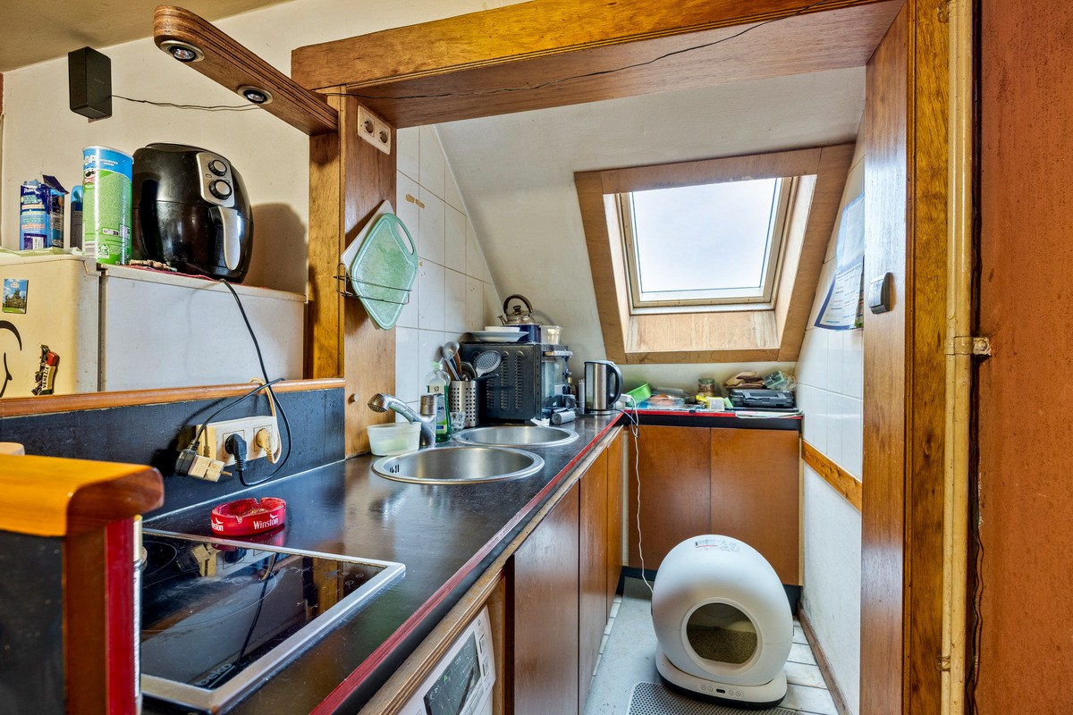 Opbrengsteigendom met handelspand en 3 appartementen te koop in Heverlee op een super ligging! 