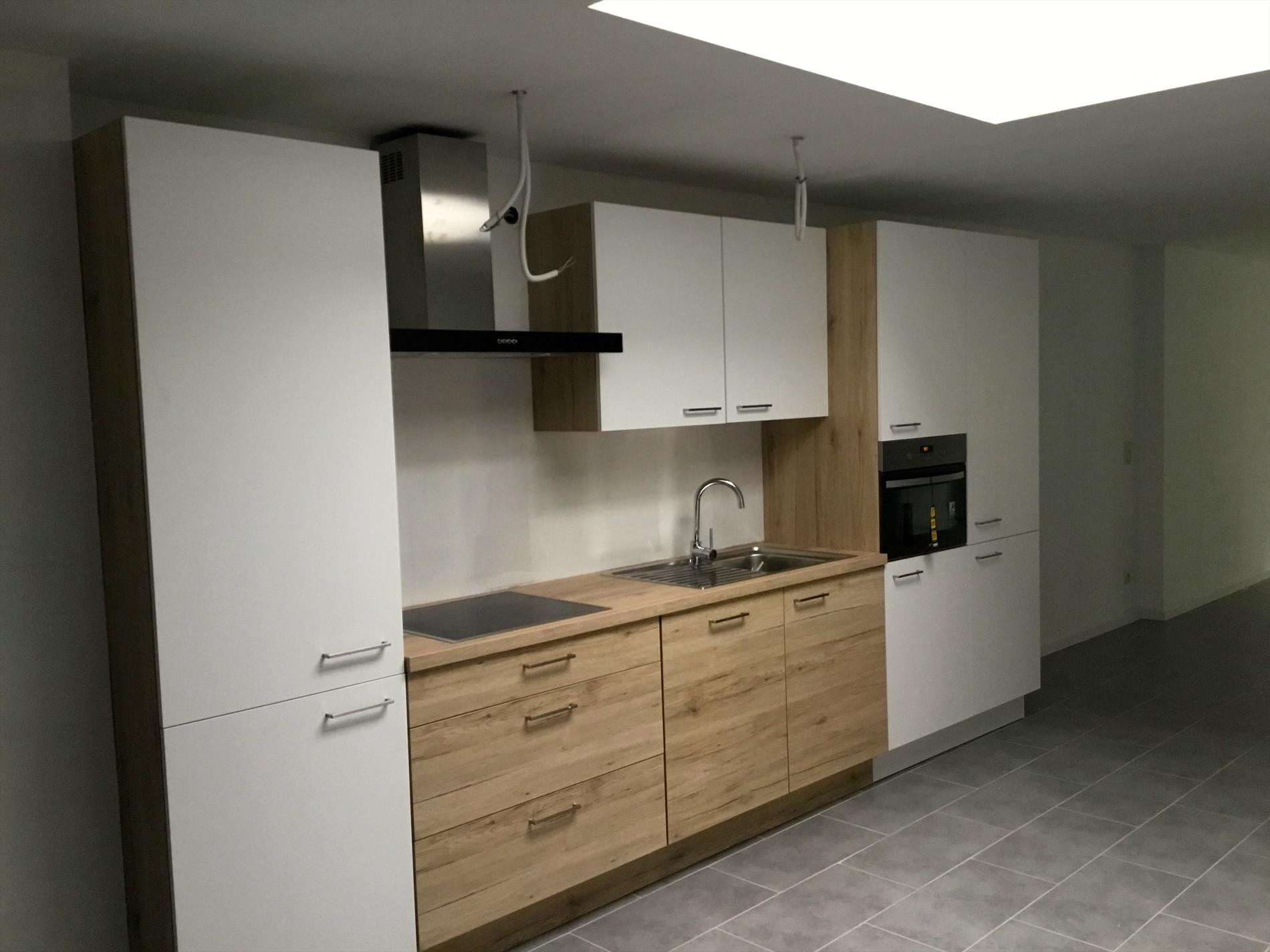 Instapklare eengezinswoning met aangelegde tuin in centrum Temse 