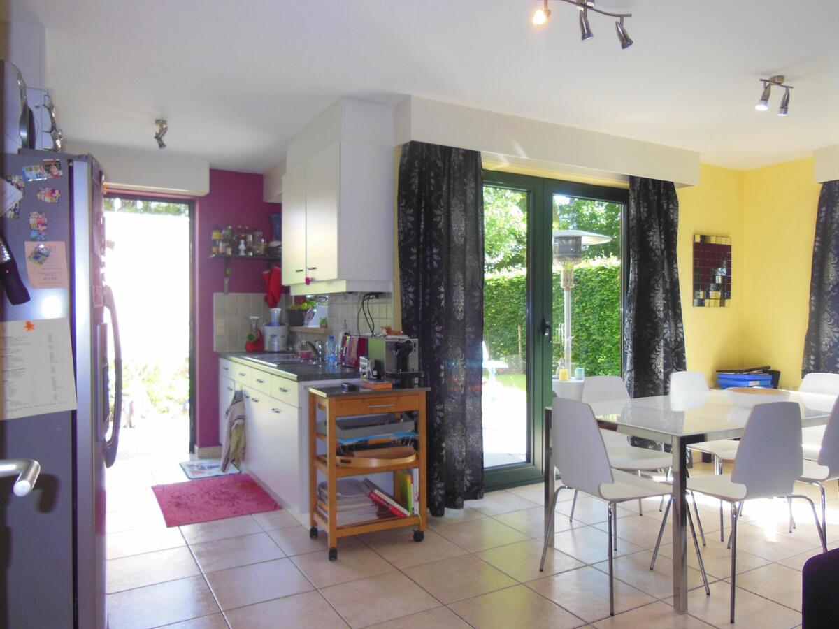 Gezellig gelijkvloersappartement met zonnige tuin en garage 