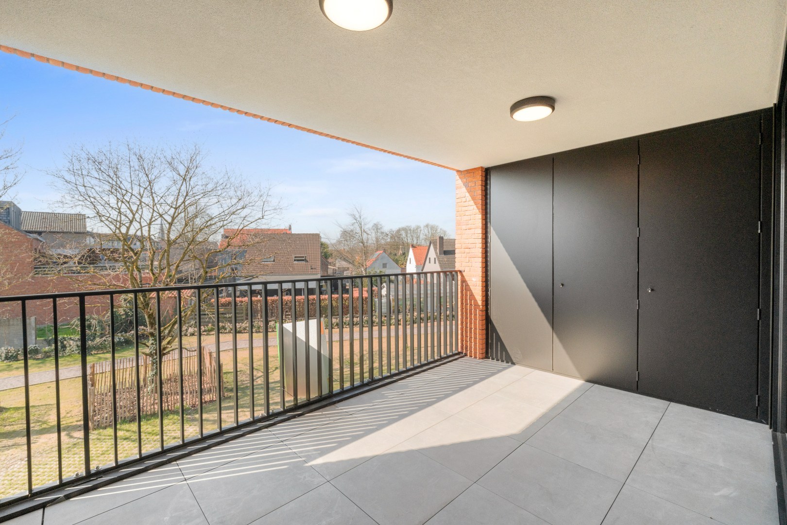 Nieuwbouwappartement met één slaapkamer, terras en ondergrondse autostaanplaats te koop in Zulte 