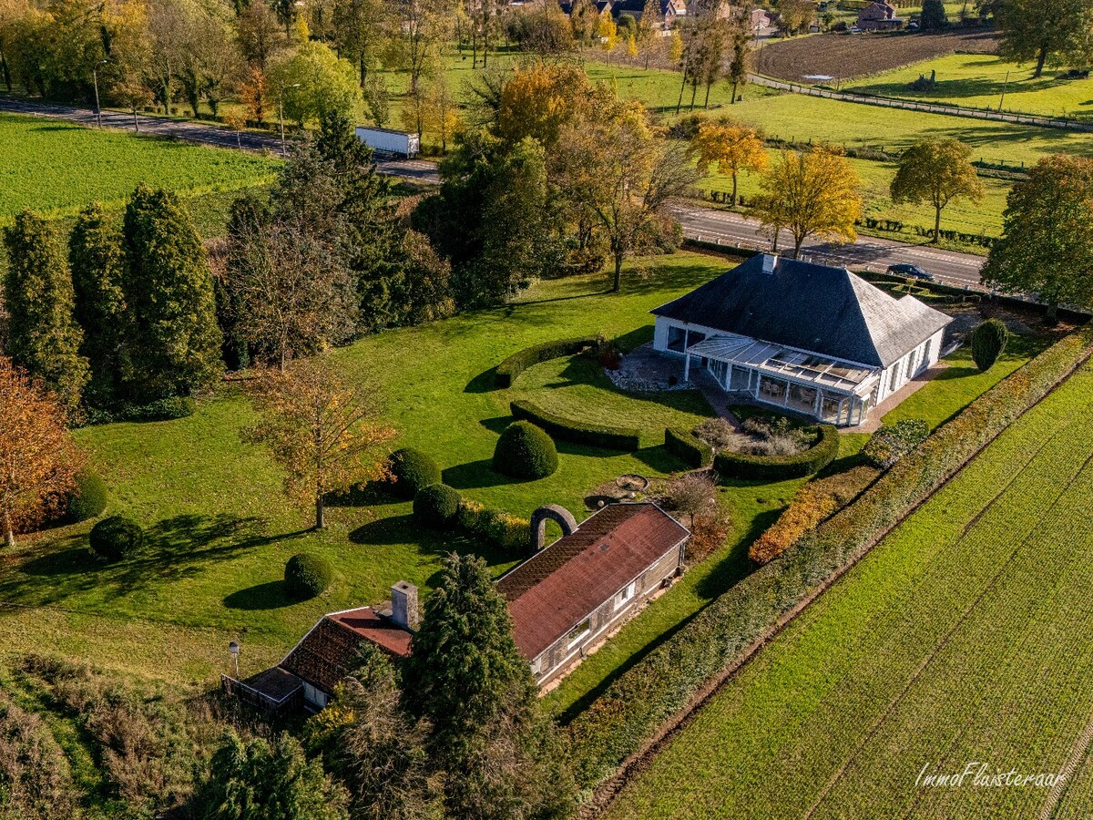 Rural villa with multifunctional outbuilding on approximately 51 acres in Bilzen 