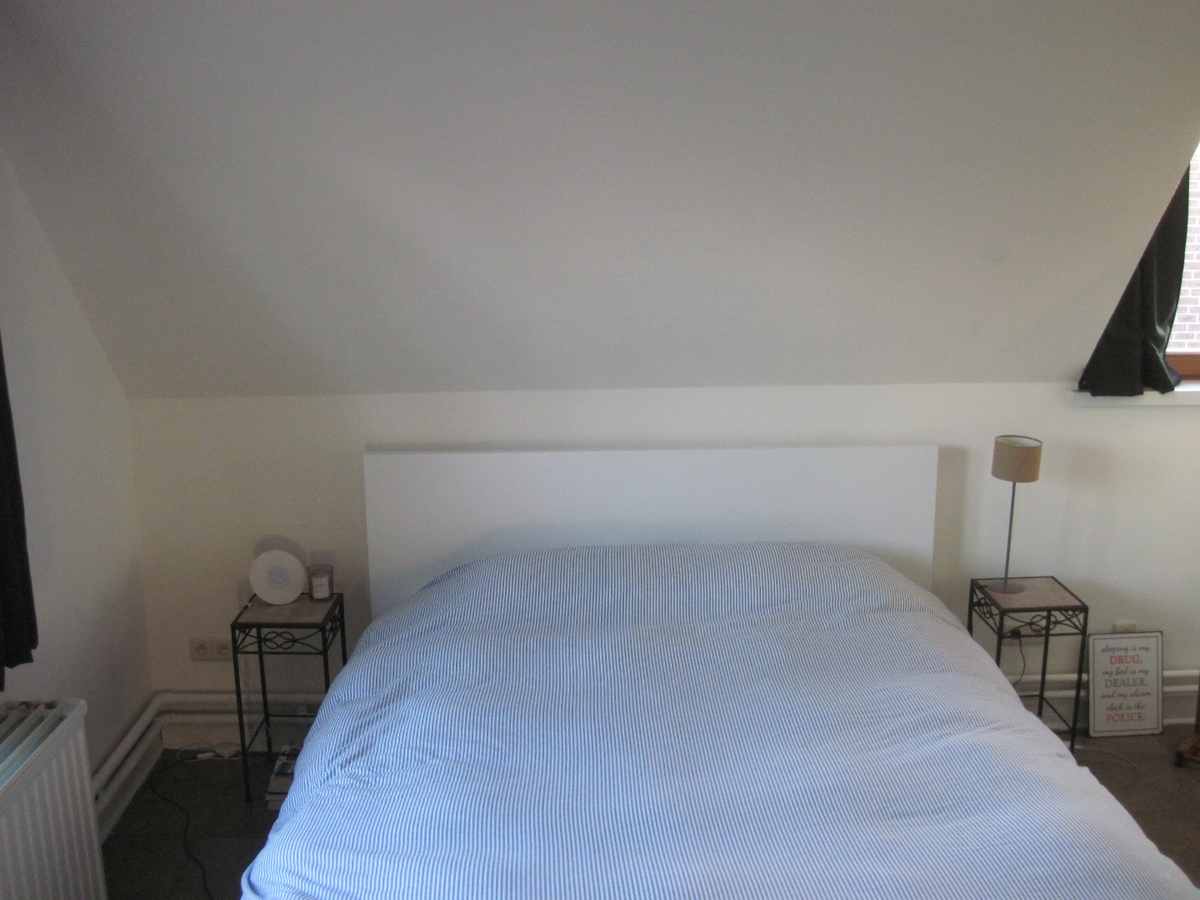 Degelijke én gezellige woning. Met tuin en met garage. 