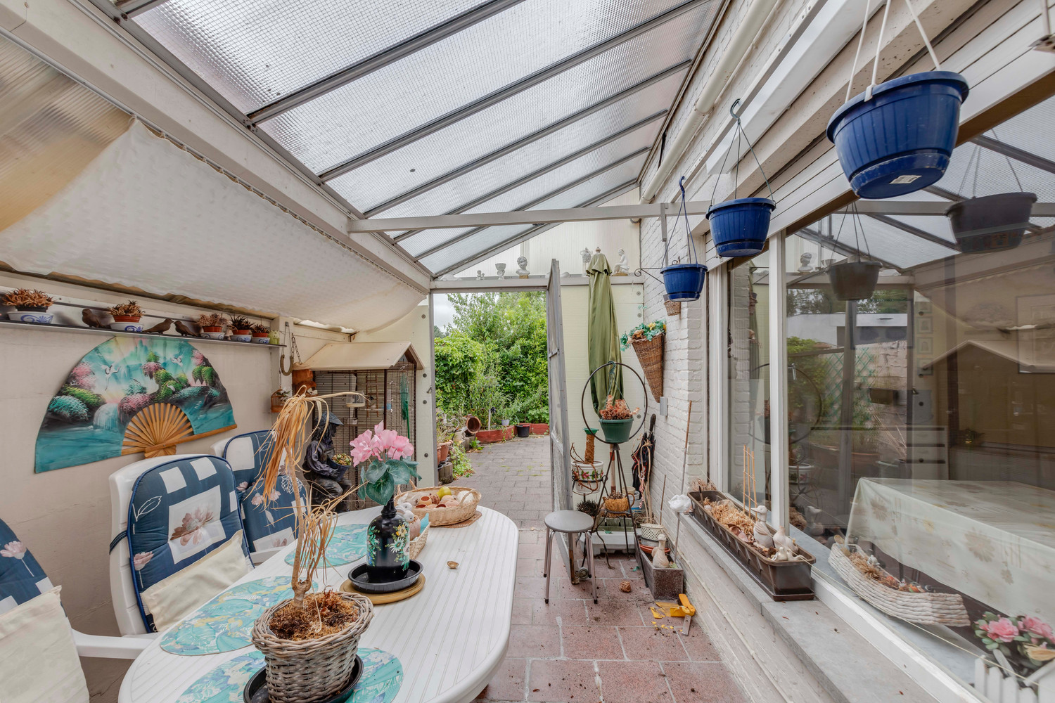 Buitenkans: rijwoning met tuin te Serskamp 