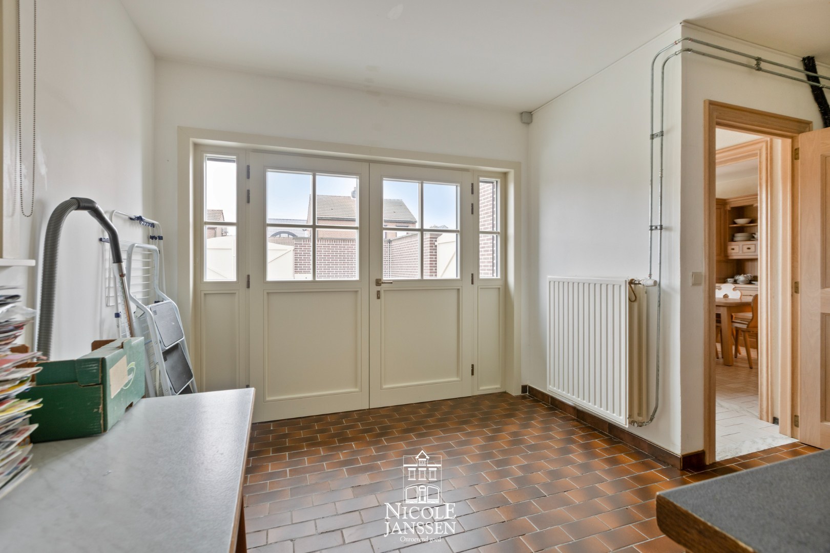 Voormalige garage werd omgevormd tot berging